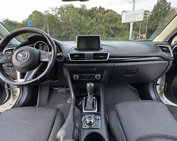 Білий Мазда 3, об'ємом двигуна 2 л та пробігом 178 тис. км за 12900 $, фото 12 на Automoto.ua