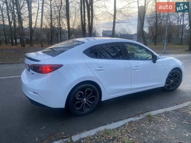 Білий Мазда 3, об'ємом двигуна 2 л та пробігом 120 тис. км за 12500 $, фото 8 на Automoto.ua