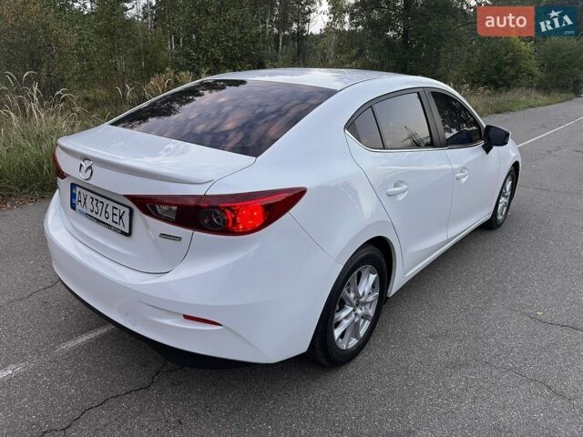 Білий Мазда 3, об'ємом двигуна 1.5 л та пробігом 89 тис. км за 14700 $, фото 12 на Automoto.ua