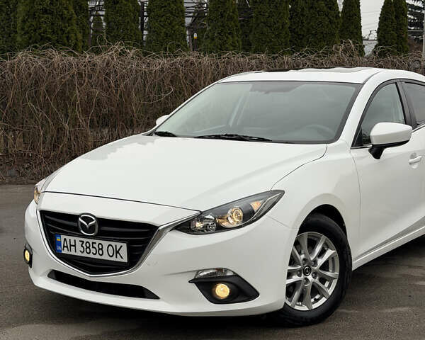 Білий Мазда 3, об'ємом двигуна 2 л та пробігом 170 тис. км за 10400 $, фото 14 на Automoto.ua