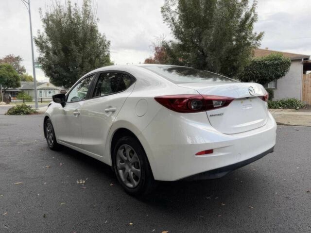 Білий Мазда 3, об'ємом двигуна 2 л та пробігом 70 тис. км за 8700 $, фото 6 на Automoto.ua