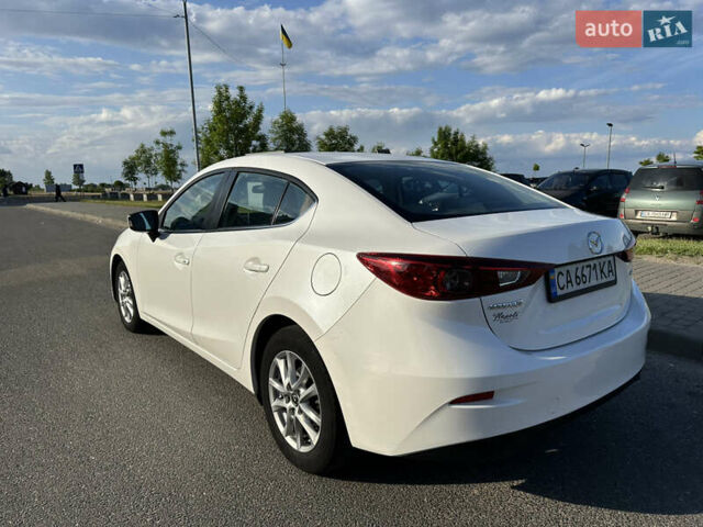 Білий Мазда 3, об'ємом двигуна 2 л та пробігом 156 тис. км за 10799 $, фото 6 на Automoto.ua
