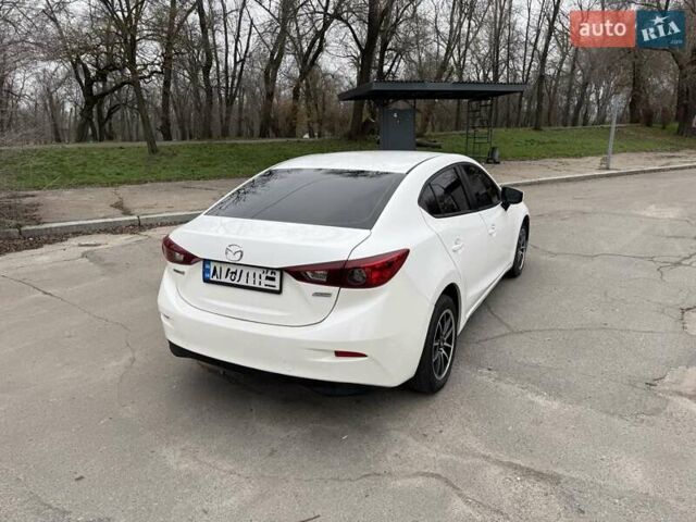 Белый Мазда 3, объемом двигателя 2 л и пробегом 142 тыс. км за 9000 $, фото 3 на Automoto.ua