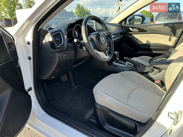Білий Мазда 3, об'ємом двигуна 2 л та пробігом 156 тис. км за 10799 $, фото 14 на Automoto.ua