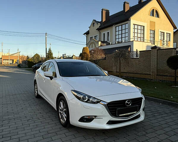 Білий Мазда 3, об'ємом двигуна 1.5 л та пробігом 96 тис. км за 15500 $, фото 4 на Automoto.ua