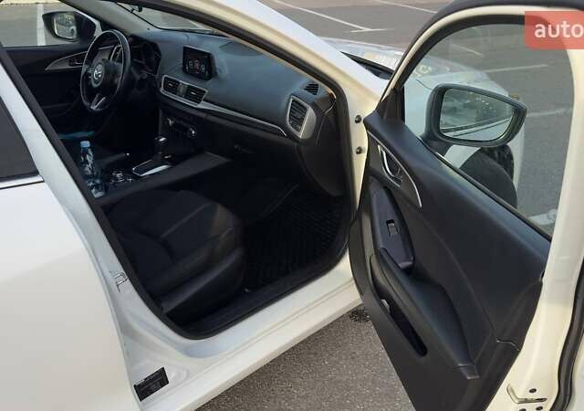 Білий Мазда 3, об'ємом двигуна 1.5 л та пробігом 144 тис. км за 13500 $, фото 16 на Automoto.ua
