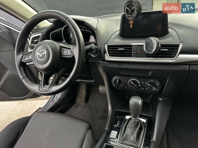Белый Мазда 3, объемом двигателя 2 л и пробегом 196 тыс. км за 11000 $, фото 28 на Automoto.ua