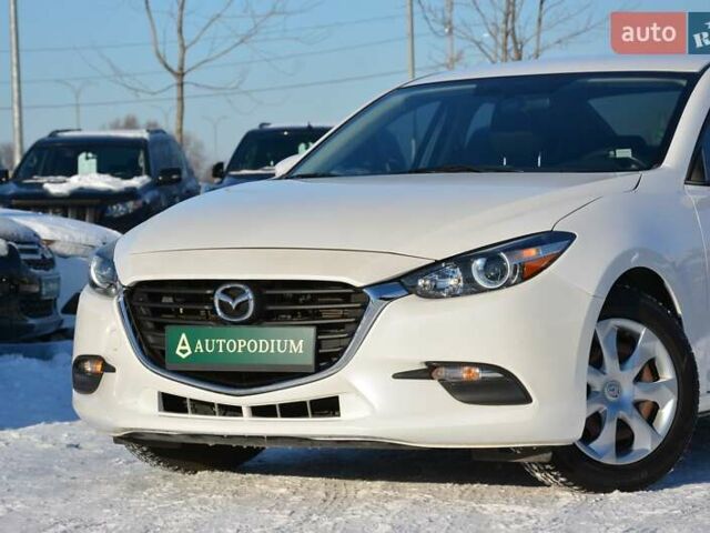 Білий Мазда 3, об'ємом двигуна 2 л та пробігом 90 тис. км за 12700 $, фото 4 на Automoto.ua