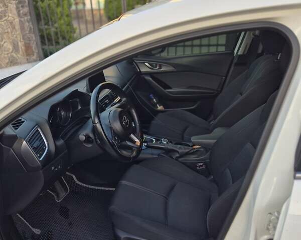 Білий Мазда 3, об'ємом двигуна 1.5 л та пробігом 107 тис. км за 14700 $, фото 16 на Automoto.ua
