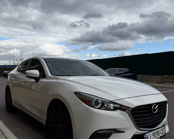 Белый Мазда 3, объемом двигателя 2 л и пробегом 193 тыс. км за 13500 $, фото 5 на Automoto.ua