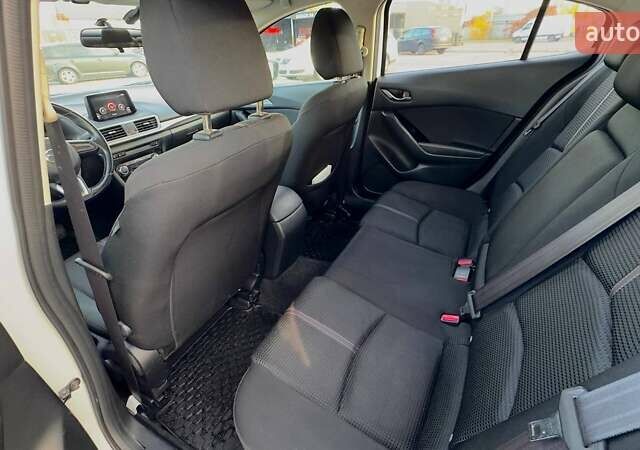 Білий Мазда 3, об'ємом двигуна 1.5 л та пробігом 144 тис. км за 13500 $, фото 14 на Automoto.ua