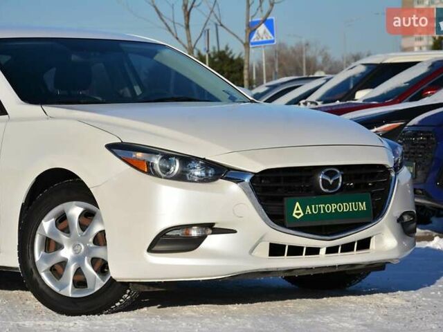 Белый Мазда 3, объемом двигателя 2 л и пробегом 90 тыс. км за 12999 $, фото 1 на Automoto.ua