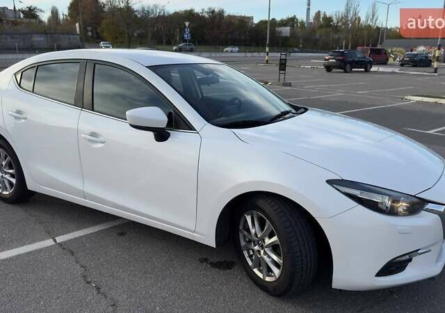 Білий Мазда 3, об'ємом двигуна 1.5 л та пробігом 144 тис. км за 13500 $, фото 3 на Automoto.ua