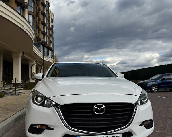 Белый Мазда 3, объемом двигателя 2 л и пробегом 193 тыс. км за 13500 $, фото 3 на Automoto.ua