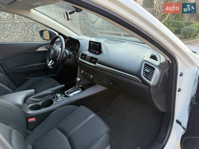 Білий Мазда 3, об'ємом двигуна 1.5 л та пробігом 96 тис. км за 15500 $, фото 18 на Automoto.ua