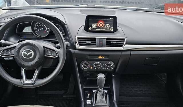 Белый Мазда 3, объемом двигателя 2 л и пробегом 130 тыс. км за 9900 $, фото 9 на Automoto.ua