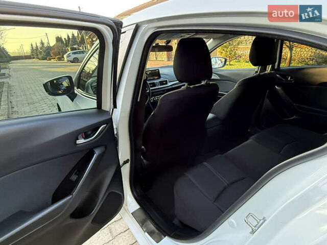 Білий Мазда 3, об'ємом двигуна 1.5 л та пробігом 96 тис. км за 15500 $, фото 14 на Automoto.ua