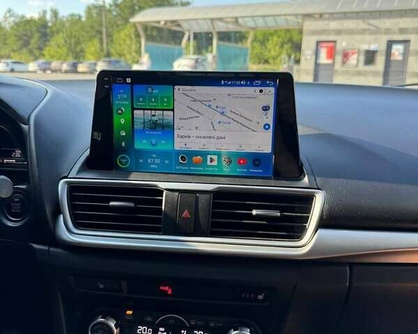 Білий Мазда 3, об'ємом двигуна 2.49 л та пробігом 108 тис. км за 12800 $, фото 12 на Automoto.ua