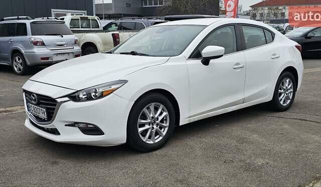 Белый Мазда 3, объемом двигателя 2 л и пробегом 130 тыс. км за 9900 $, фото 2 на Automoto.ua
