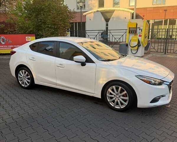 Белый Мазда 3, объемом двигателя 2 л и пробегом 109 тыс. км за 11800 $, фото 5 на Automoto.ua