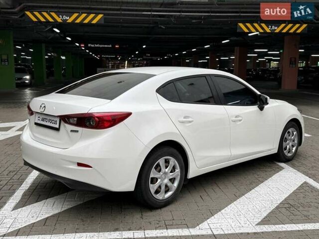 Білий Мазда 3, об'ємом двигуна 2 л та пробігом 90 тис. км за 14490 $, фото 5 на Automoto.ua