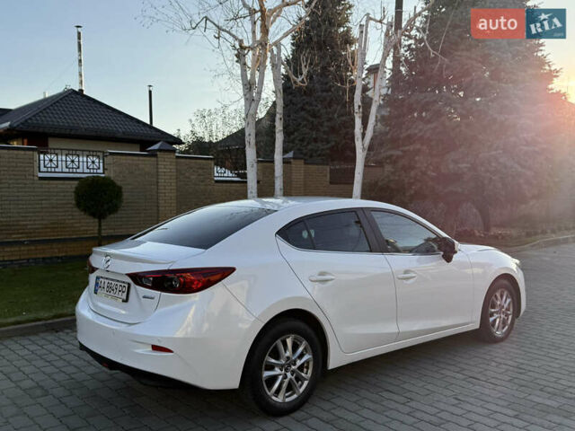 Білий Мазда 3, об'ємом двигуна 1.5 л та пробігом 96 тис. км за 15500 $, фото 9 на Automoto.ua