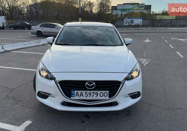 Білий Мазда 3, об'ємом двигуна 1.5 л та пробігом 144 тис. км за 13500 $, фото 2 на Automoto.ua