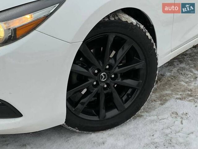 Белый Мазда 3, объемом двигателя 2 л и пробегом 196 тыс. км за 10990 $, фото 3 на Automoto.ua