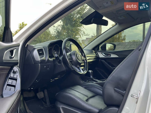 Белый Мазда 3, объемом двигателя 2.49 л и пробегом 110 тыс. км за 15700 $, фото 13 на Automoto.ua