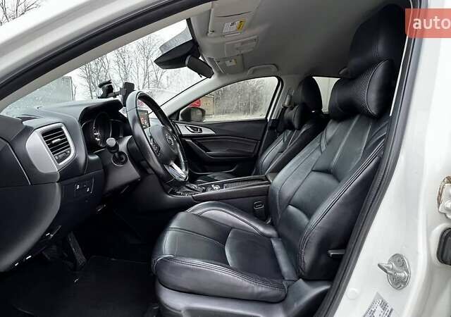 Белый Мазда 3, объемом двигателя 2 л и пробегом 196 тыс. км за 10990 $, фото 15 на Automoto.ua