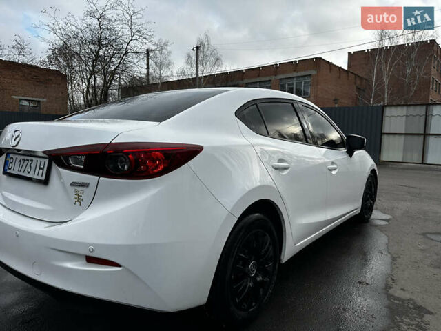 Белый Мазда 3, объемом двигателя 2 л и пробегом 196 тыс. км за 11000 $, фото 11 на Automoto.ua