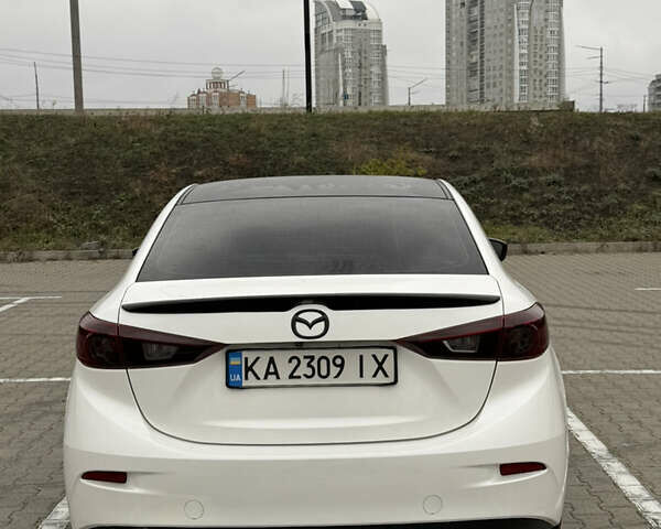 Белый Мазда 3, объемом двигателя 2 л и пробегом 173 тыс. км за 10500 $, фото 2 на Automoto.ua
