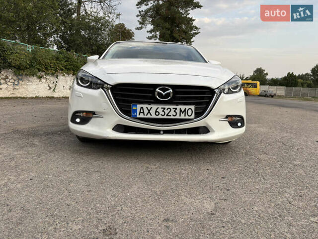 Белый Мазда 3, объемом двигателя 1.5 л и пробегом 88 тыс. км за 13200 $, фото 6 на Automoto.ua