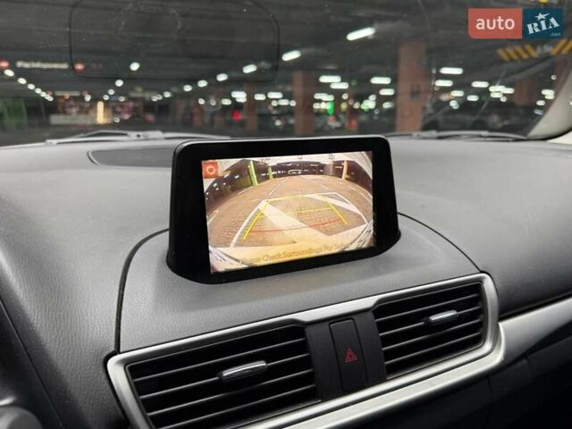 Білий Мазда 3, об'ємом двигуна 2 л та пробігом 90 тис. км за 14490 $, фото 14 на Automoto.ua