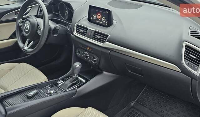 Белый Мазда 3, объемом двигателя 2 л и пробегом 130 тыс. км за 9900 $, фото 16 на Automoto.ua