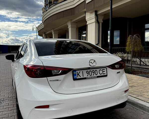 Белый Мазда 3, объемом двигателя 2 л и пробегом 193 тыс. км за 13500 $, фото 4 на Automoto.ua