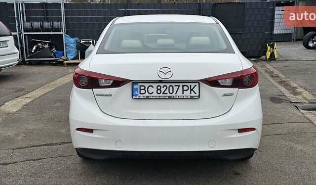 Белый Мазда 3, объемом двигателя 2 л и пробегом 130 тыс. км за 9900 $, фото 6 на Automoto.ua