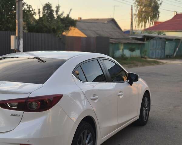 Білий Мазда 3, об'ємом двигуна 1.5 л та пробігом 107 тис. км за 14700 $, фото 4 на Automoto.ua