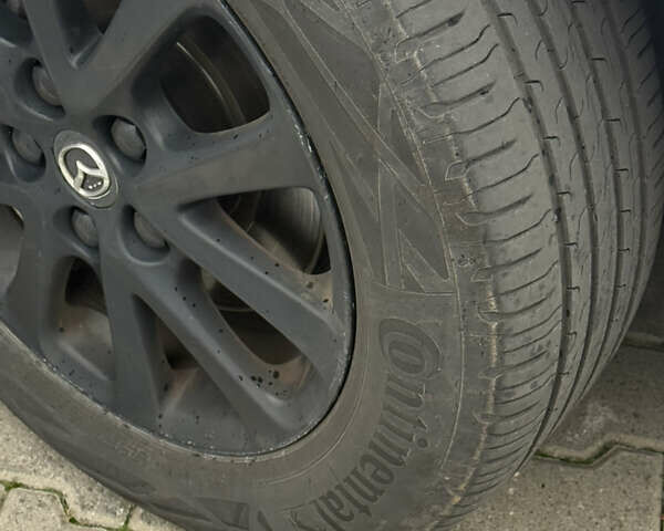 Белый Мазда 3, объемом двигателя 2 л и пробегом 173 тыс. км за 10500 $, фото 8 на Automoto.ua