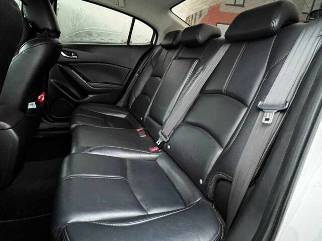 Белый Мазда 3, объемом двигателя 2 л и пробегом 196 тыс. км за 10990 $, фото 18 на Automoto.ua