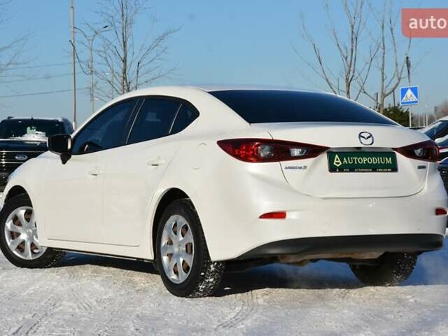 Білий Мазда 3, об'ємом двигуна 2 л та пробігом 90 тис. км за 12700 $, фото 5 на Automoto.ua