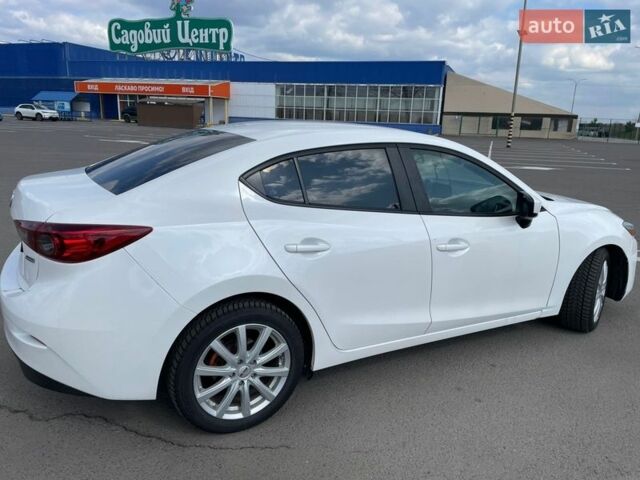 Белый Мазда 3, объемом двигателя 2 л и пробегом 110 тыс. км за 10500 $, фото 5 на Automoto.ua