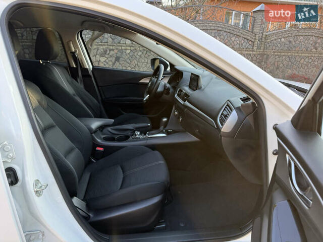 Білий Мазда 3, об'ємом двигуна 1.5 л та пробігом 96 тис. км за 15500 $, фото 20 на Automoto.ua