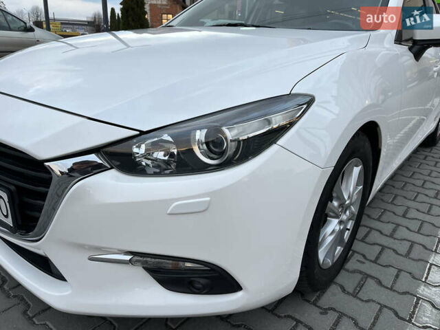 Белый Мазда 3, объемом двигателя 1.5 л и пробегом 144 тыс. км за 14500 $, фото 8 на Automoto.ua