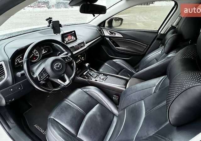 Белый Мазда 3, объемом двигателя 2 л и пробегом 196 тыс. км за 10990 $, фото 19 на Automoto.ua