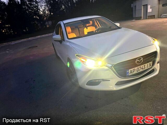 Білий Мазда 3, об'ємом двигуна 2 л та пробігом 101 тис. км за 11000 $, фото 4 на Automoto.ua