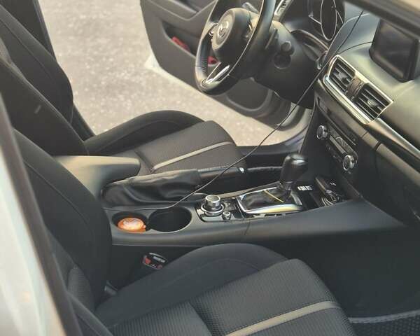 Білий Мазда 3, об'ємом двигуна 1.5 л та пробігом 107 тис. км за 14700 $, фото 9 на Automoto.ua