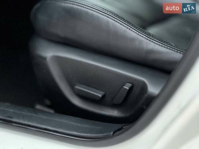 Белый Мазда 3, объемом двигателя 2 л и пробегом 196 тыс. км за 10990 $, фото 16 на Automoto.ua