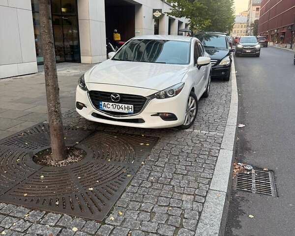 Белый Мазда 3, объемом двигателя 2 л и пробегом 109 тыс. км за 11800 $, фото 7 на Automoto.ua