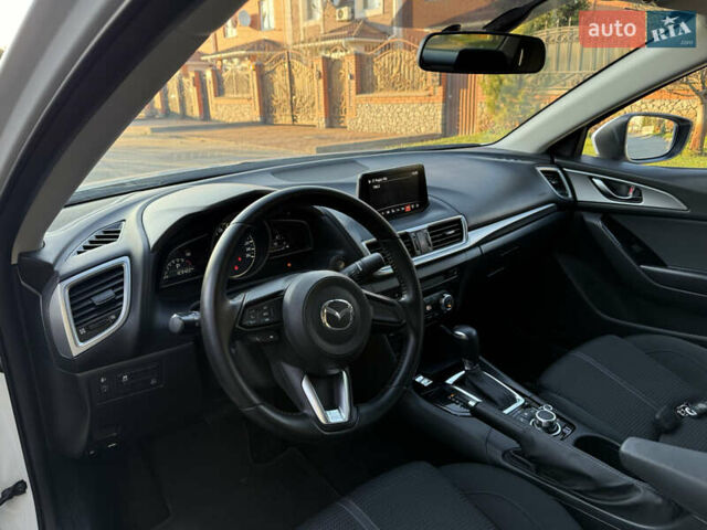 Білий Мазда 3, об'ємом двигуна 1.5 л та пробігом 96 тис. км за 15500 $, фото 12 на Automoto.ua